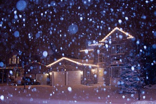 photographing snow falling at night